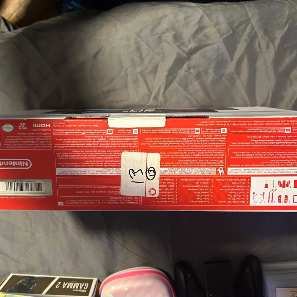 Nintendo Switch with gray Dock, Blue Kirby Case and Sonic Controller Accents,